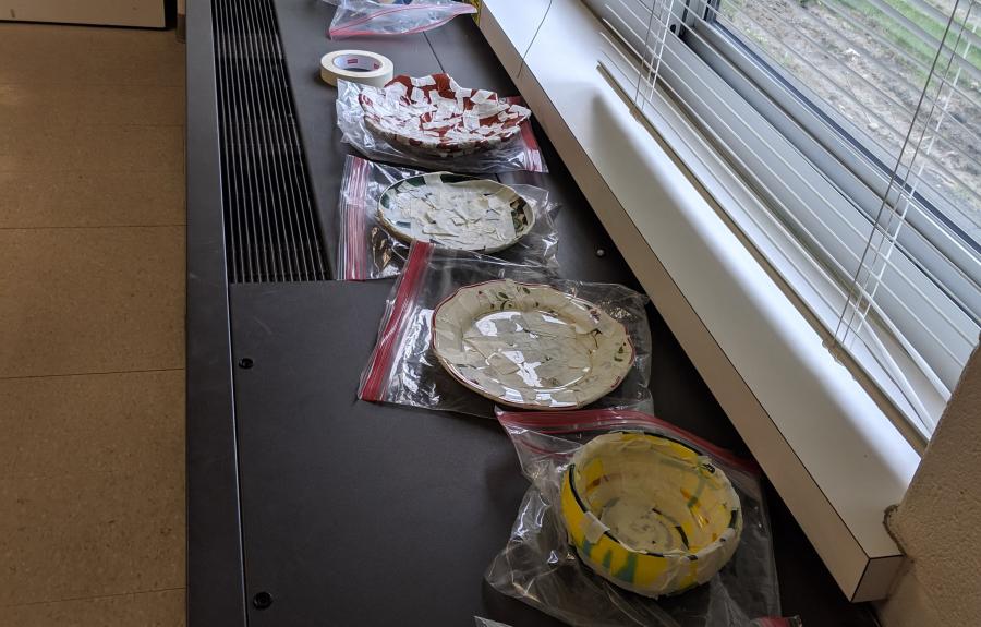 Ceramic dishes resting on a radiator