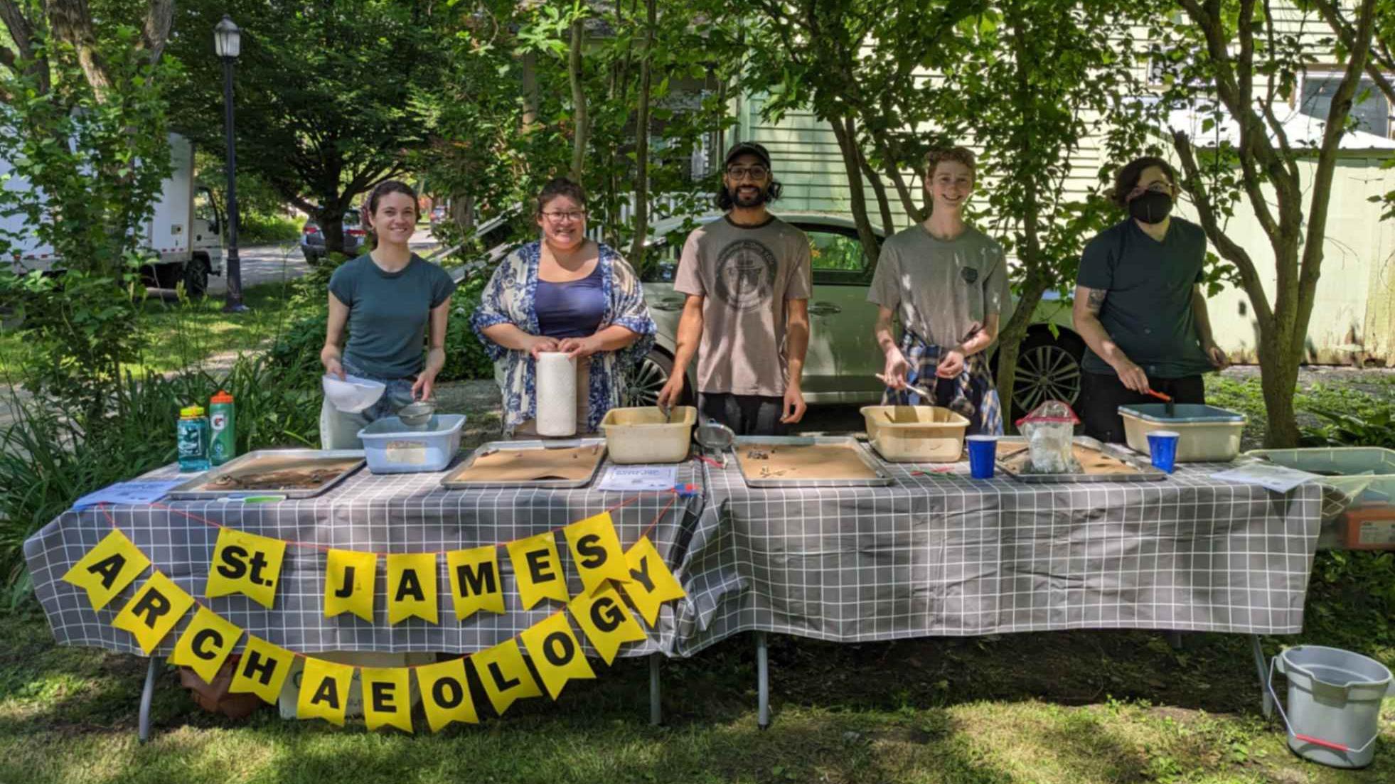 CIAMS graduate students hosting an artifacts washing activity for Juneteenth