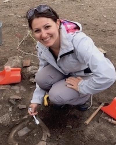 Anna Passerini working in field